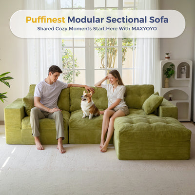 Green modular sectional sofa with a couple and a dog in a bright living room.